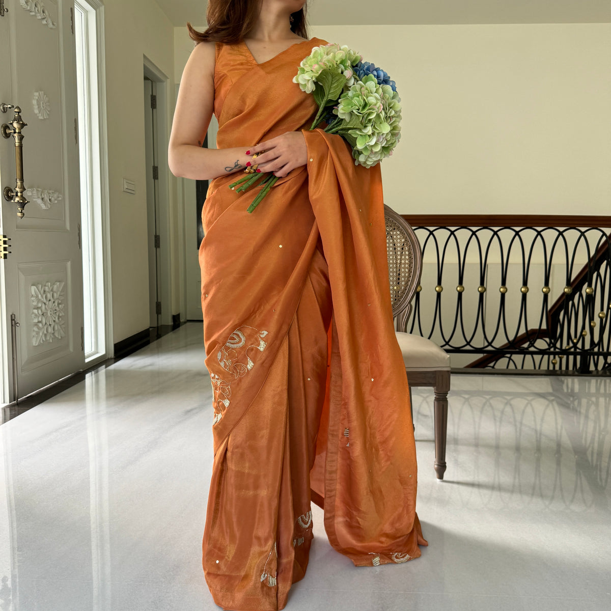 Rust Embroidered Tissue Saree